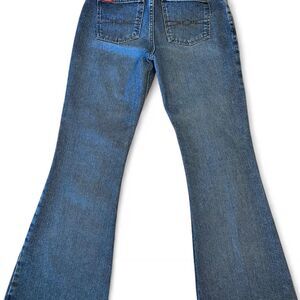 Y2k low-rise flared MUDD kidcore jeans.